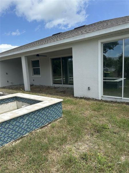 Exterior details and patio area of a home in , Englewood (Image 3).