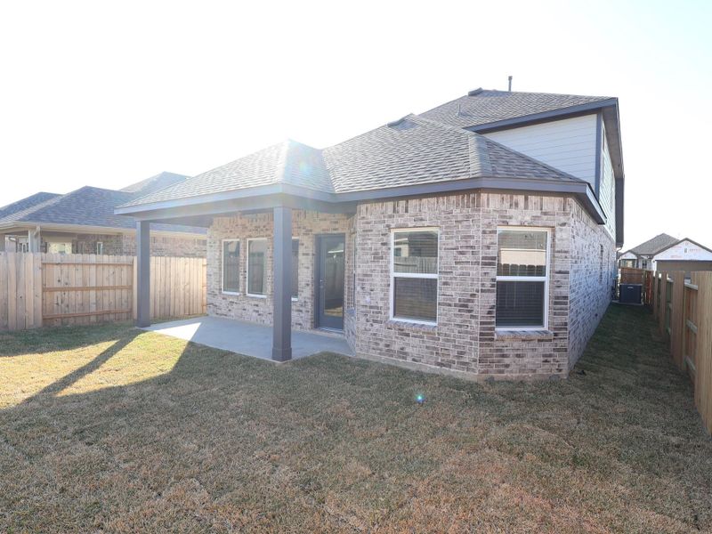 Exterior details and patio area of a home in Marvida, Cypress (Image 21).