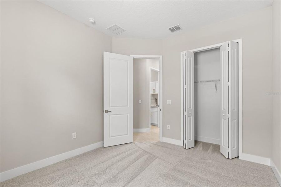 Spacious, unfurnished interior of a new home in Gray Hawk at Hole Two, Daytona Beach (Image 22).