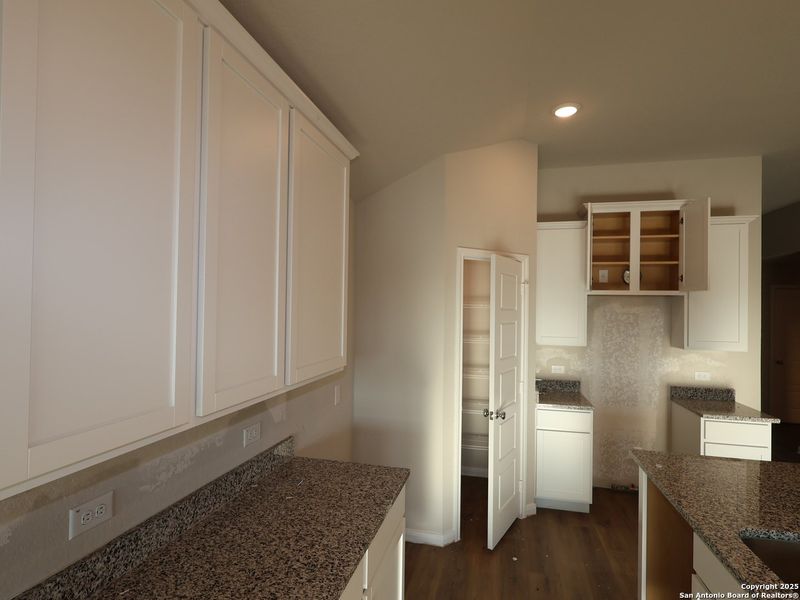 Furnished interior view inside a new home in Agave, San Antonio (Image 11).