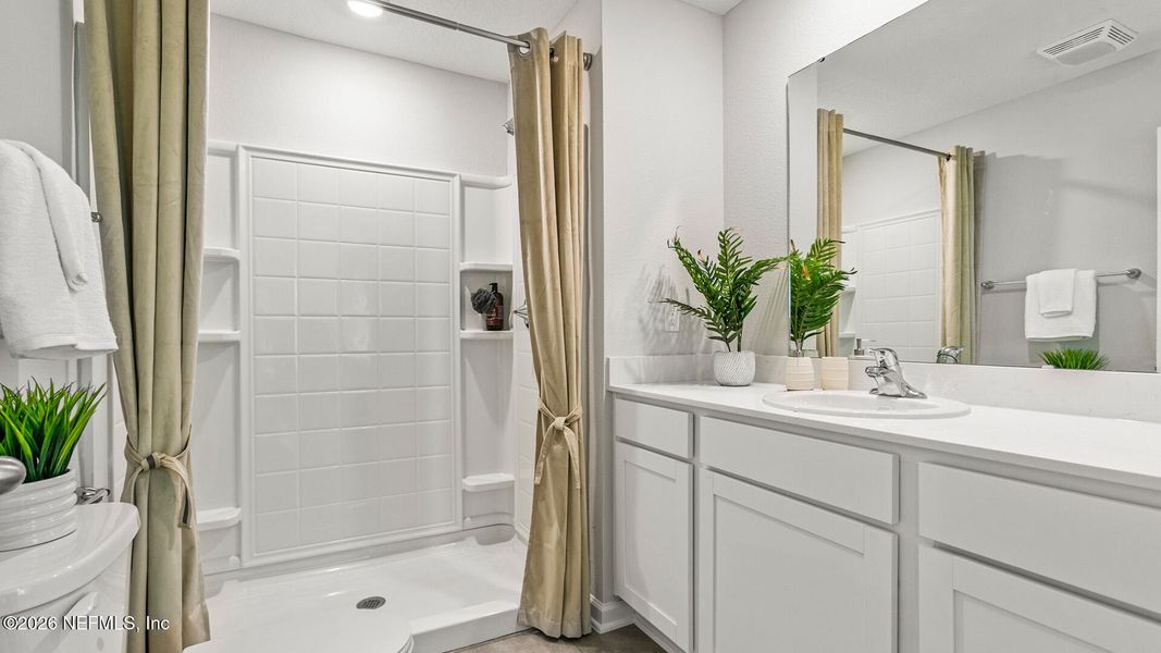 Furnished interior view inside a new home in Cordera Townhomes, St. Augustine (Image 18).
