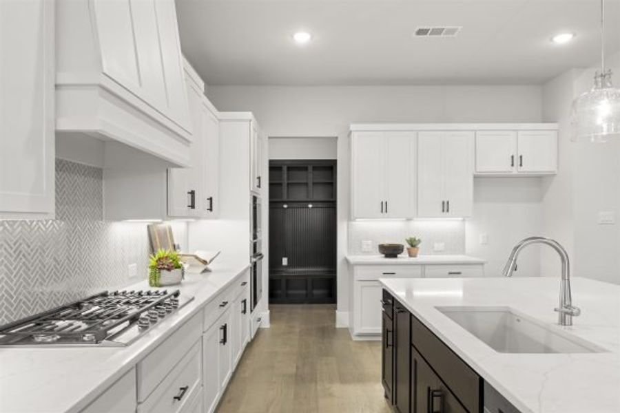 Representative furnished interior of a home built from the Tahiti by Stonefield Homes in Heath Golf and Yacht Club, Rockwall (Image 41).