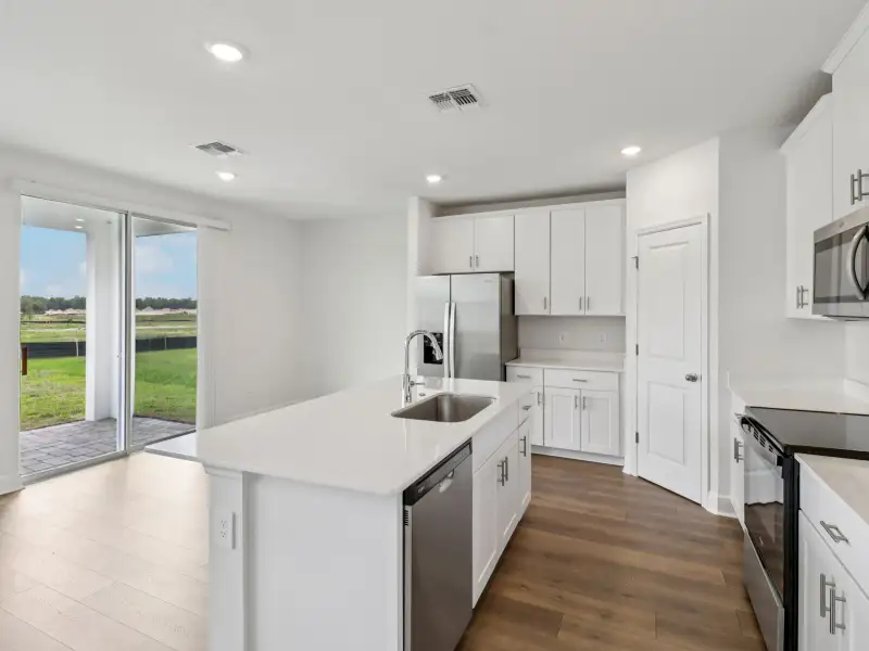 Furnished interior view inside a new home in Villamar - Classic Series, Winter Haven (Image 4).