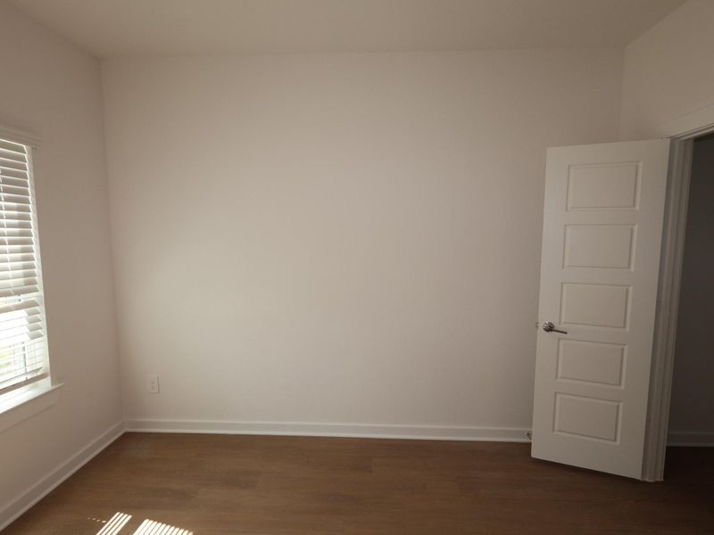 Spacious, unfurnished interior of a new home in Pinewood at Grand Texas, New Caney (Image 25).