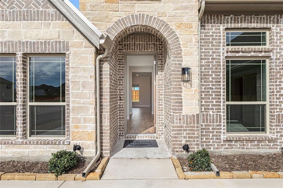 Exterior details and patio area of a home in Stone River Glen 60s, Royse City (Image 20).