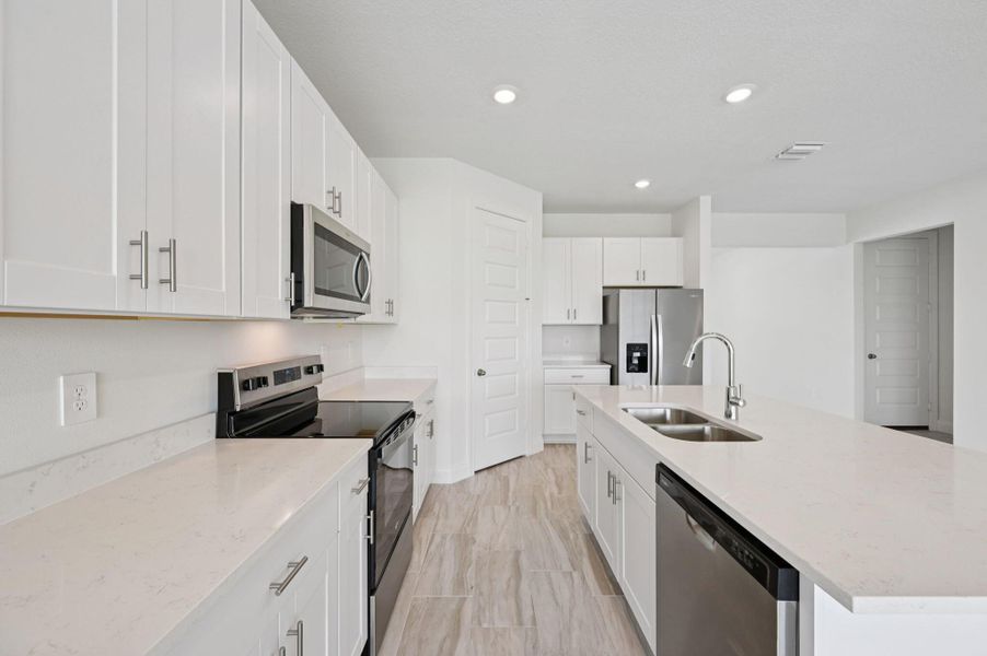 Furnished interior view inside a new home in Brystol at Wylder - Reserve Series, Port St. Lucie (Image 9).