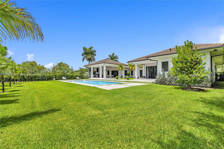 Front exterior of a new home in , Pinecrest, FL, highlighting curb appeal (Image 18).