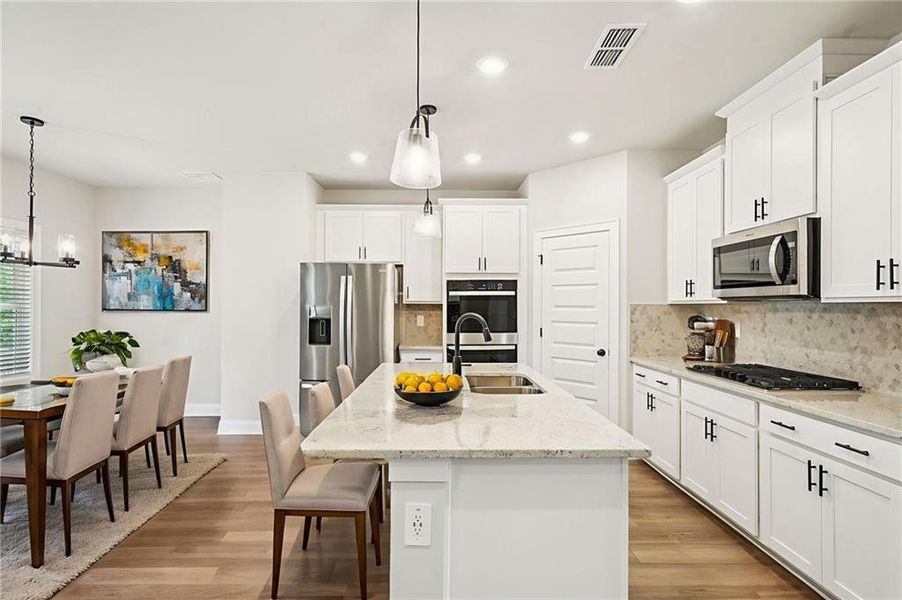 Furnished interior view inside a new home in Martin Springs - Estate Series, Lawrenceville (Image 13).
