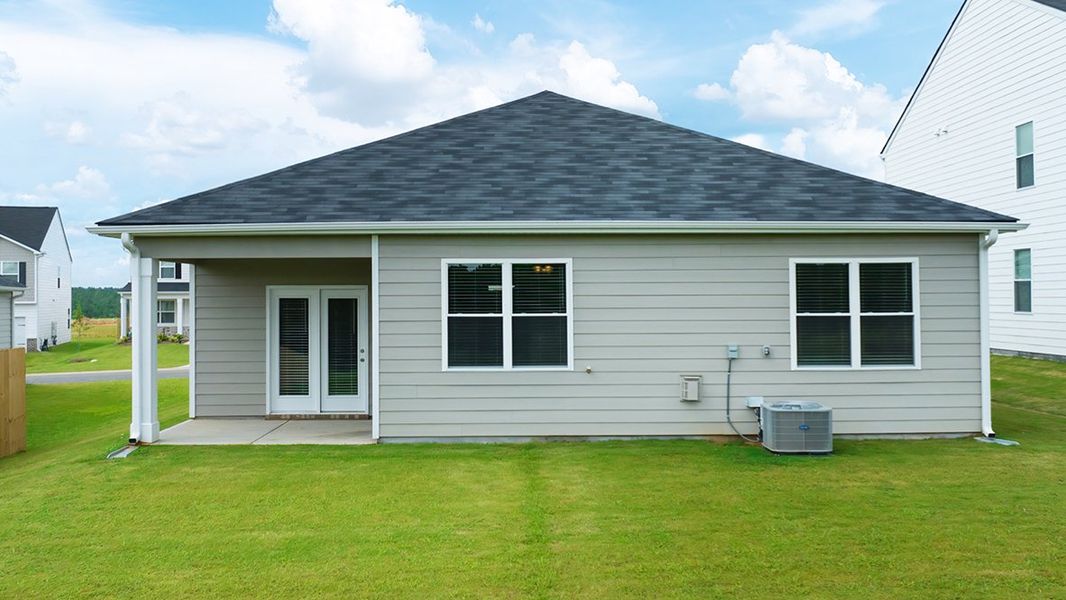 Exterior details and patio area of a home in Highland Hills, Graniteville (Image 2).