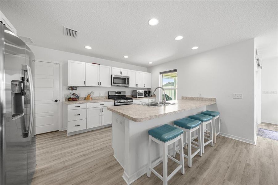 Furnished interior view inside a new home in , Okahumpka (Image 7). Furnished interior view inside a new home in , Okahumpka (Image 7).