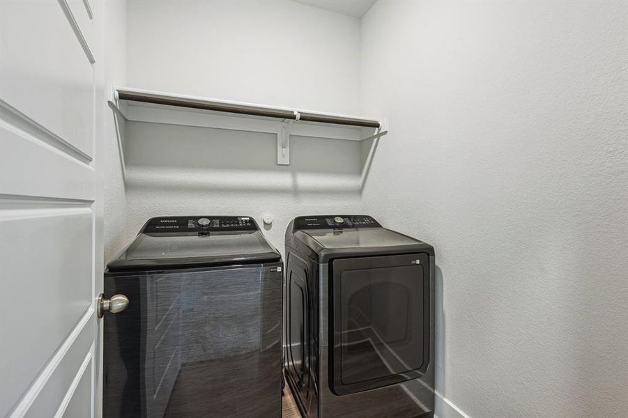 Laundry room with separate washer and dryer