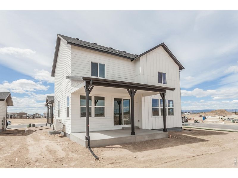 Exterior details and patio area of a home in Prairie Song Story Collection - Single Family Homes, Windsor (Image 3).