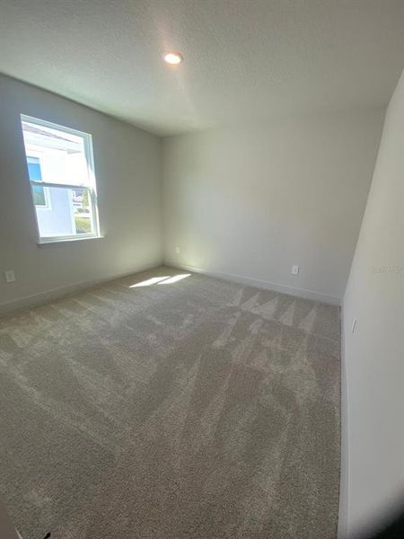 Spacious, unfurnished interior of a new home in Summerlake Reserve, Winter Garden (Image 15).