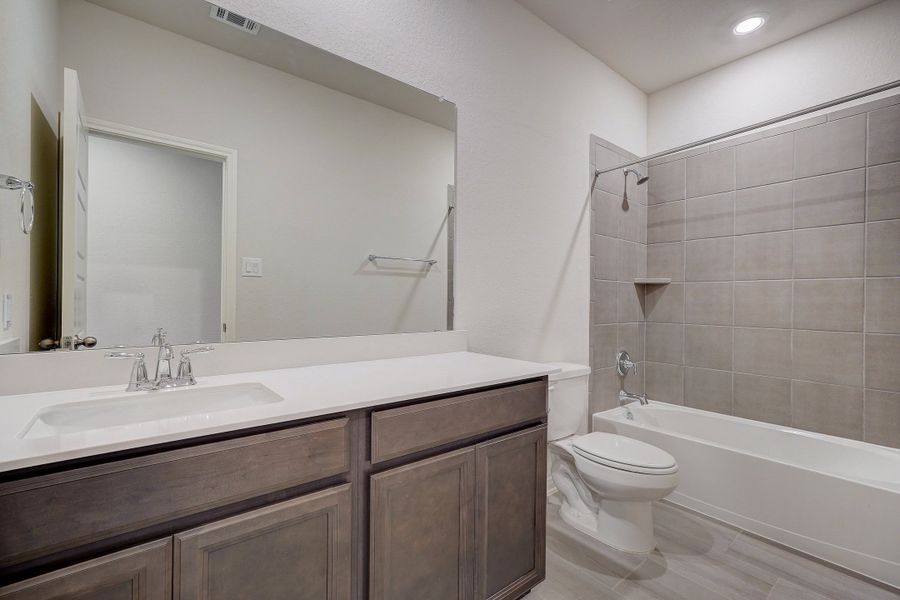 Guest bathroom in the Oleander floorplan at a Meritage Homes community.