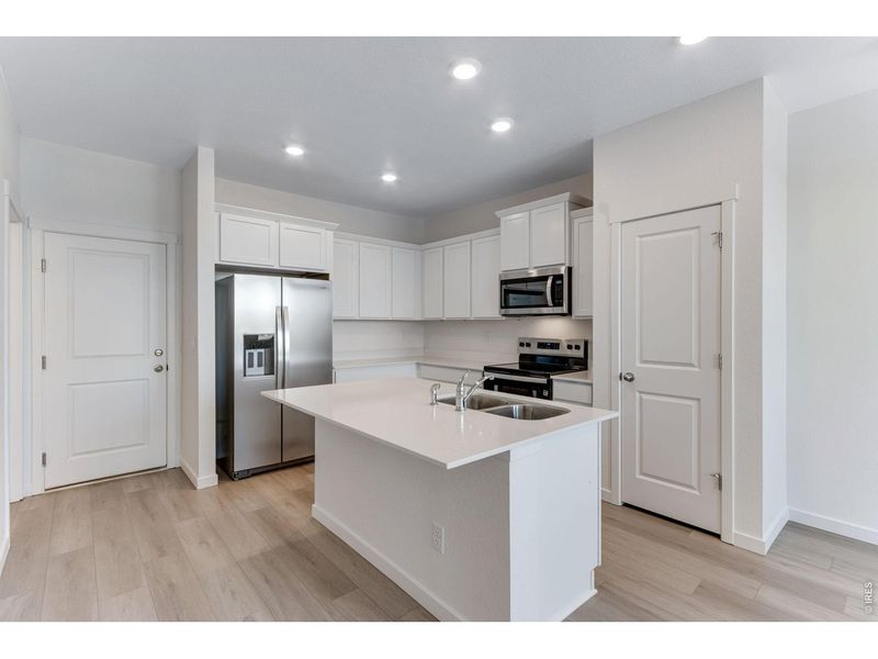 Furnished interior view inside a new home in Vista Meadows, Fort Lupton (Image 3).