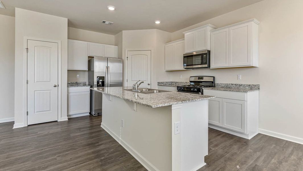 Representative furnished interior of a home built from the Darwin by D.R. Horton in Sherwood Manor, College Park (Image 5).