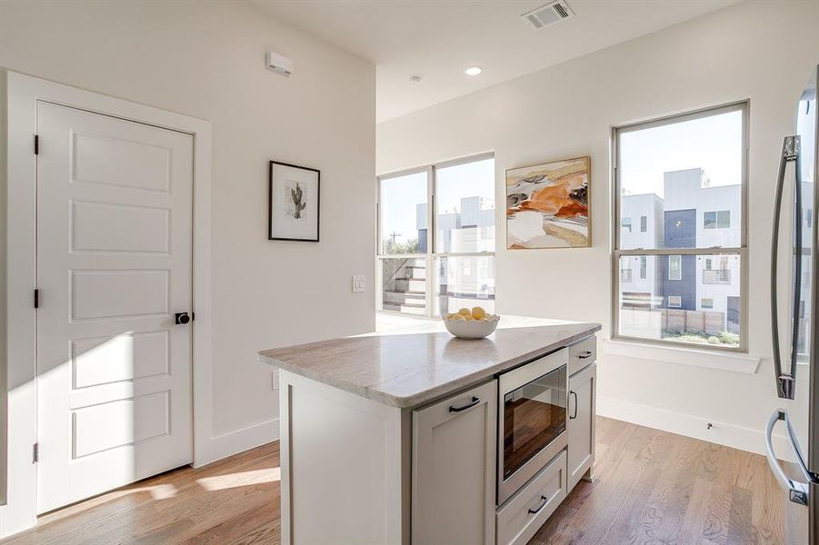 Designer kitchen lighting enhances every detail — from natural stone surfaces to matte fixtures. Designer kitchen lighting enhances every detail — from natural stone surfaces to matte fixtures.