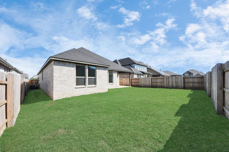 Exterior details and patio area of a home in 50' Traditional Homes at Elyson, Katy (Image 26). Exterior details and patio area of a home in 50' Traditional Homes at Elyson, Katy (Image 26).