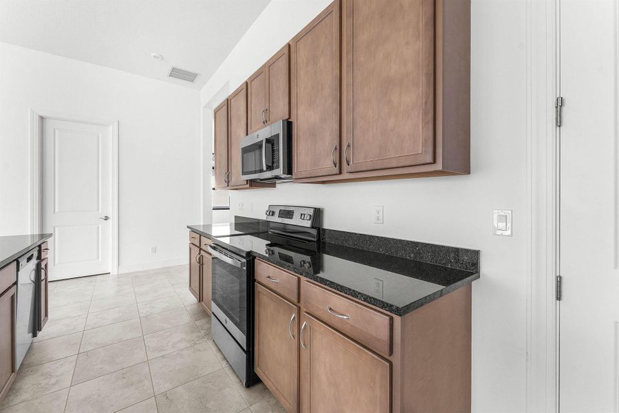 Furnished interior view inside a new home in , Port St. Lucie (Image 9).