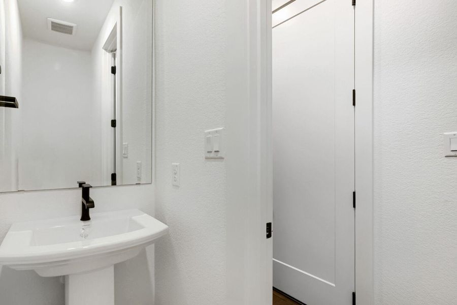 Furnished interior view inside a new home in 6 Creeks at Waterridge, Kyle (Image 30).