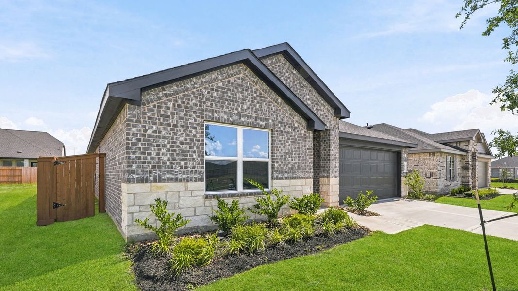 Representative exterior photo of a completed home built from the Burnet by D.R. Horton in Cypress Green, Hockley, TX (Image 2). Representative exterior photo of a completed home built from the Burnet by D.R. Horton in Cypress Green, Hockley, TX (Image 2).