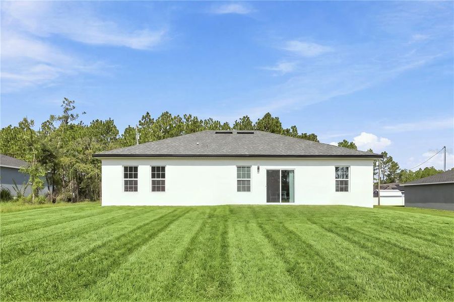 Exterior details and patio area of a home in , Ocala (Image 3).