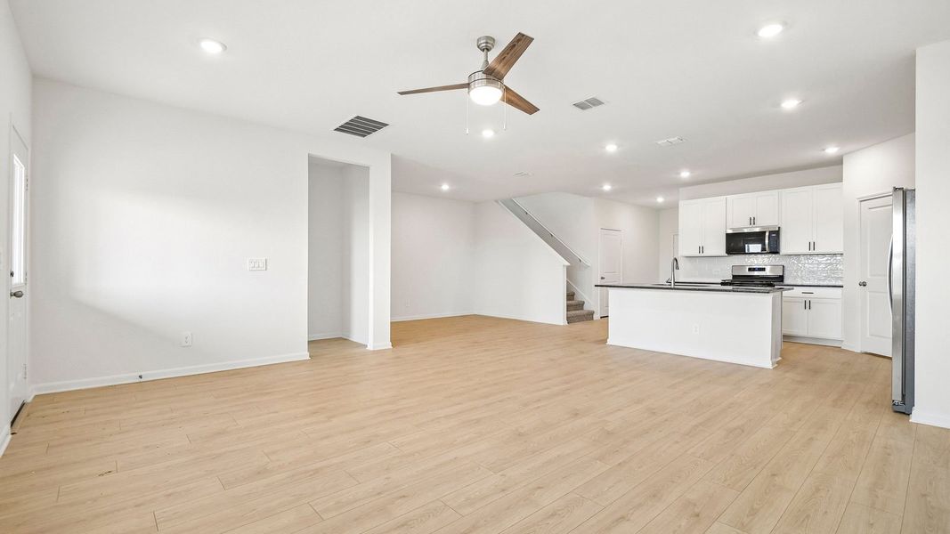 Spacious, unfurnished interior of a new home in Revelry, Del Valle (Image 16).