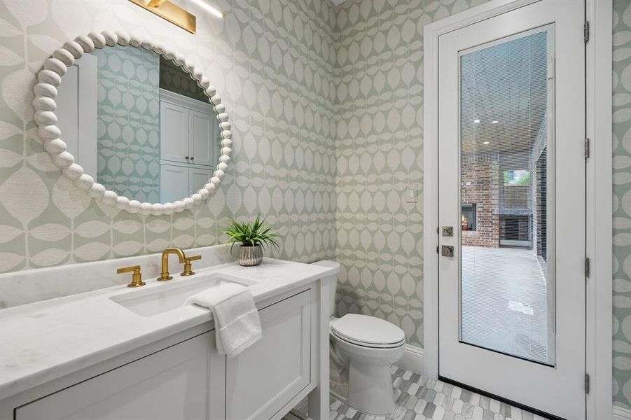 Half bath by rear porch Half bath by rear porch