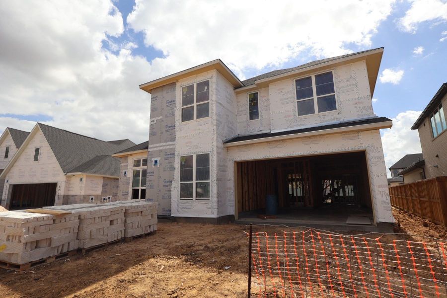 In-progress construction of a new home in Dunham Pointe, Cypress, TX (Image 11).