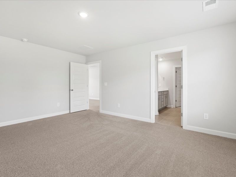 Spacious, unfurnished interior of a new home in The Farm at Wells Creek - Signature Collection, Gray Court (Image 14).