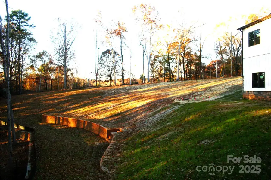 Back yard with retaining walls Back yard with retaining walls