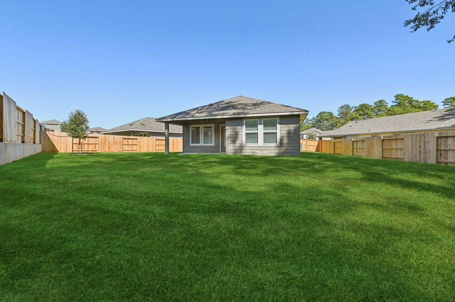 Exterior details and patio area of a home in , Conroe (Image 21).