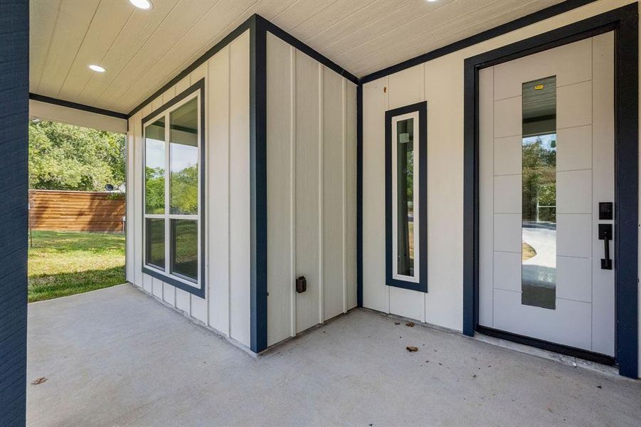 The covered front porch would be a nice spot for a chair to relax out of the sun