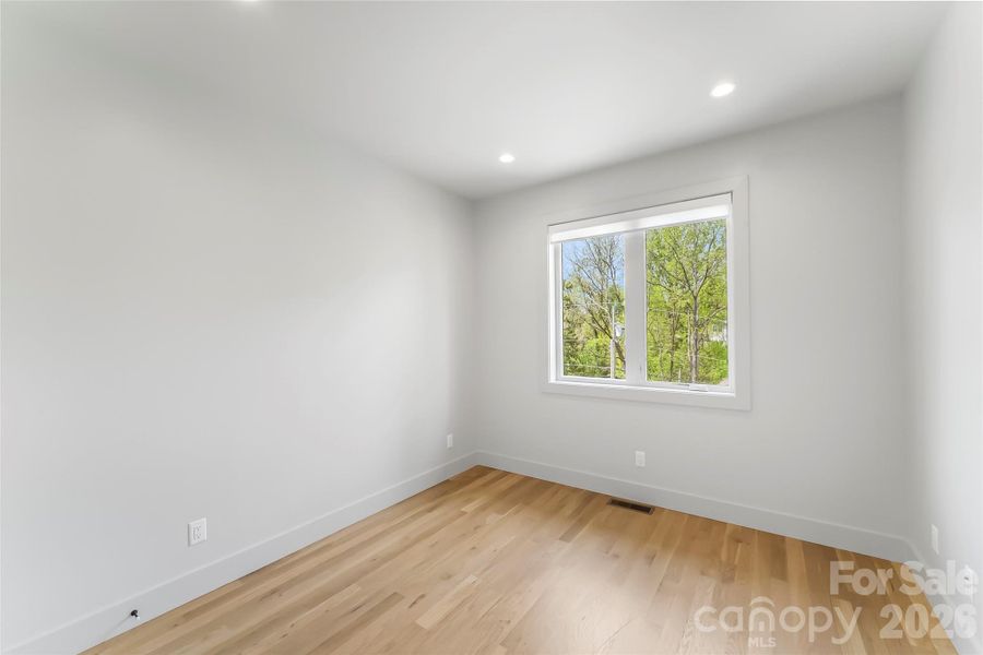 Spacious, unfurnished interior of a new home in , Asheville (Image 21).