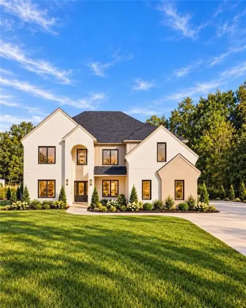 Front exterior of a new home in , Dacula, GA, highlighting curb appeal (Image 1). Front exterior of a new home in , Dacula, GA, highlighting curb appeal (Image 1).