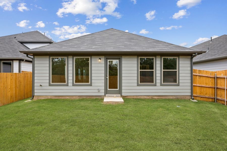 Yard in the Spruce home plan by Trophy Signature Homes - REPRESENTATIVE PHOTO