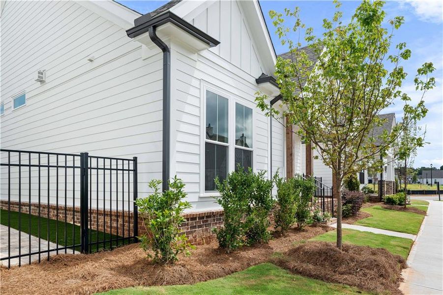 Exterior details and patio area of a home in Promenade at Sawnee Village, Cumming (Image 26). Exterior details and patio area of a home in Promenade at Sawnee Village, Cumming (Image 26).