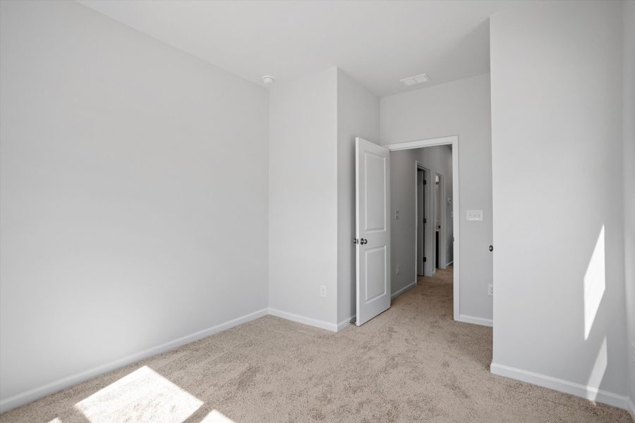 Spacious, unfurnished interior of a new home in Renaissance at White Oak, Garner (Image 24).