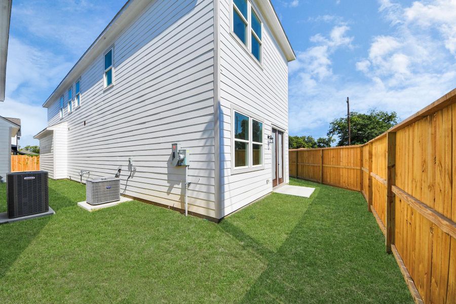 Exterior details and patio area of a home in , Houston (Image 3). Exterior details and patio area of a home in , Houston (Image 3).