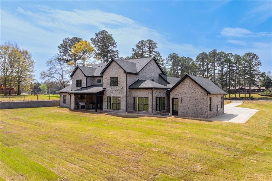 Front exterior of a new home in , Monroe, GA, highlighting curb appeal (Image 29). Front exterior of a new home in , Monroe, GA, highlighting curb appeal (Image 29).