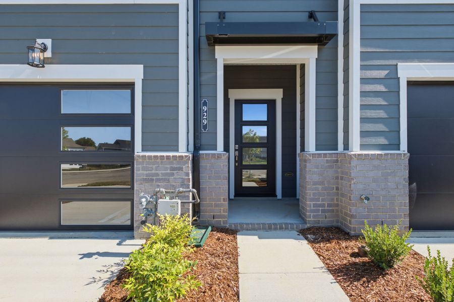 Exterior details and patio area of a home in Nexus Townhomes, Gallatin (Image 20).