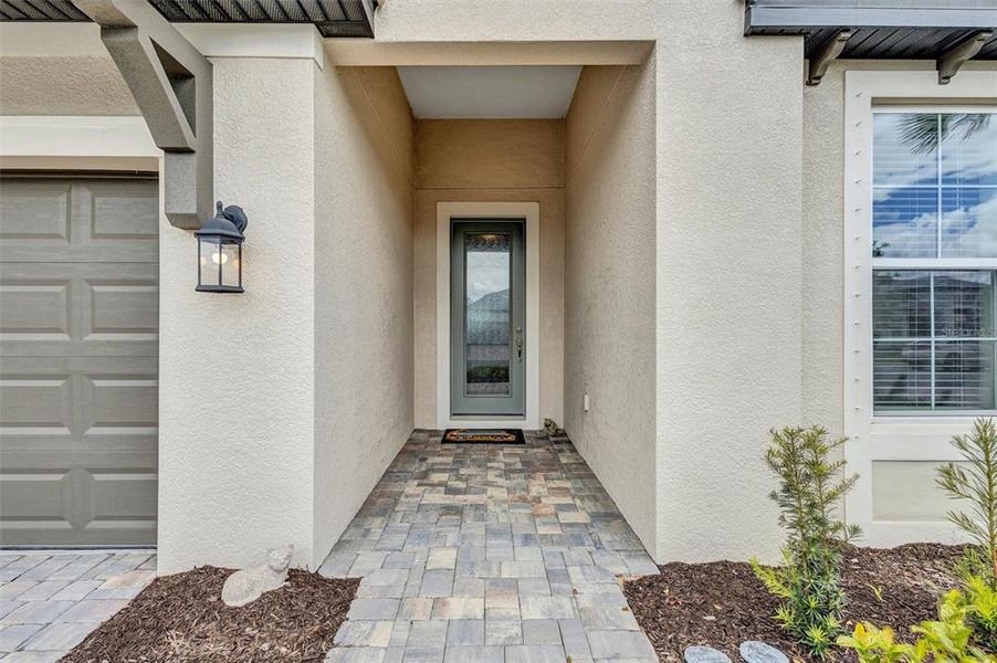 Exterior details and patio area of a home in Sweetwater at Lakewood Ranch, Bradenton (Image 23). Exterior details and patio area of a home in Sweetwater at Lakewood Ranch, Bradenton (Image 23).