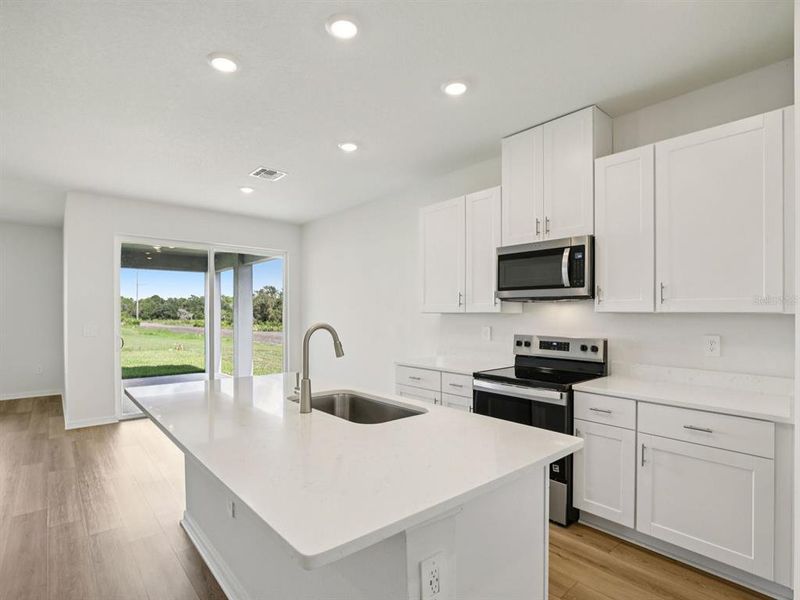 Furnished interior view inside a new home in Coasterra - Reserve Series, Palmetto (Image 4).