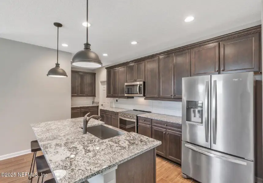 Furnished interior view inside a new home in Brook Forest - Single Family Homes, St. Augustine (Image 6).