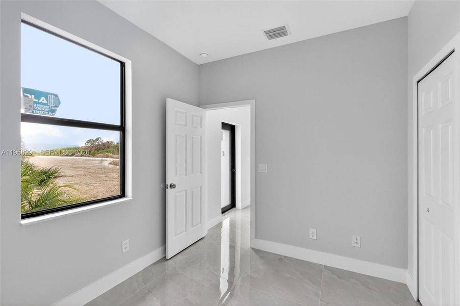 Spacious, unfurnished interior of a new home in , Lehigh Acres (Image 31).
