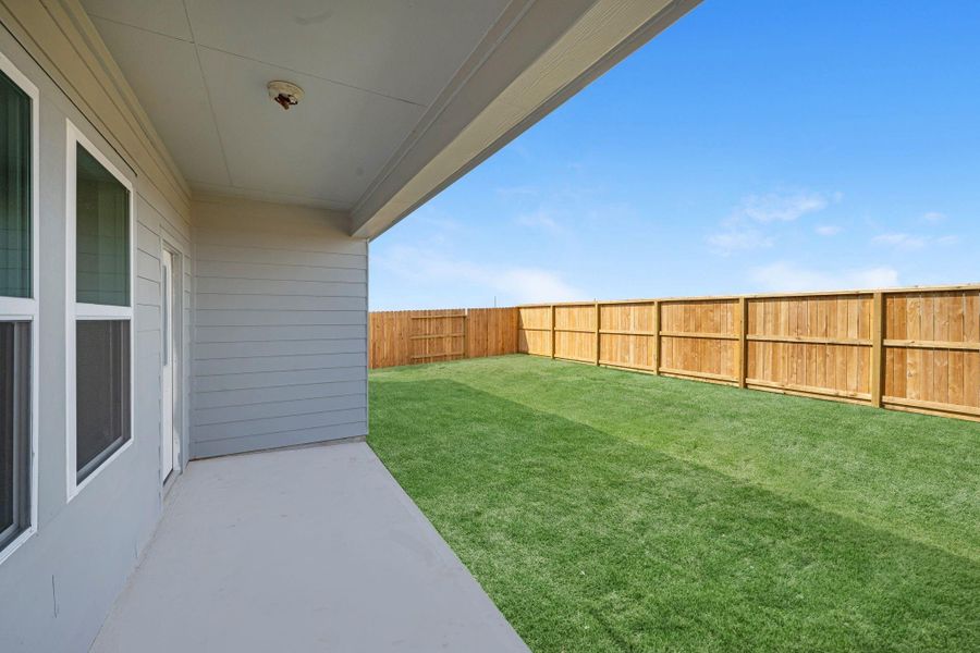 Exterior details and patio area of a home in Sunterra Lakes, Brookshire (Image 2). Exterior details and patio area of a home in Sunterra Lakes, Brookshire (Image 2).