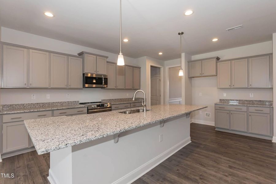 Representative furnished interior of a home built from the 2906 by Adams Homes in Norris Landing, Snellville (Image 6).