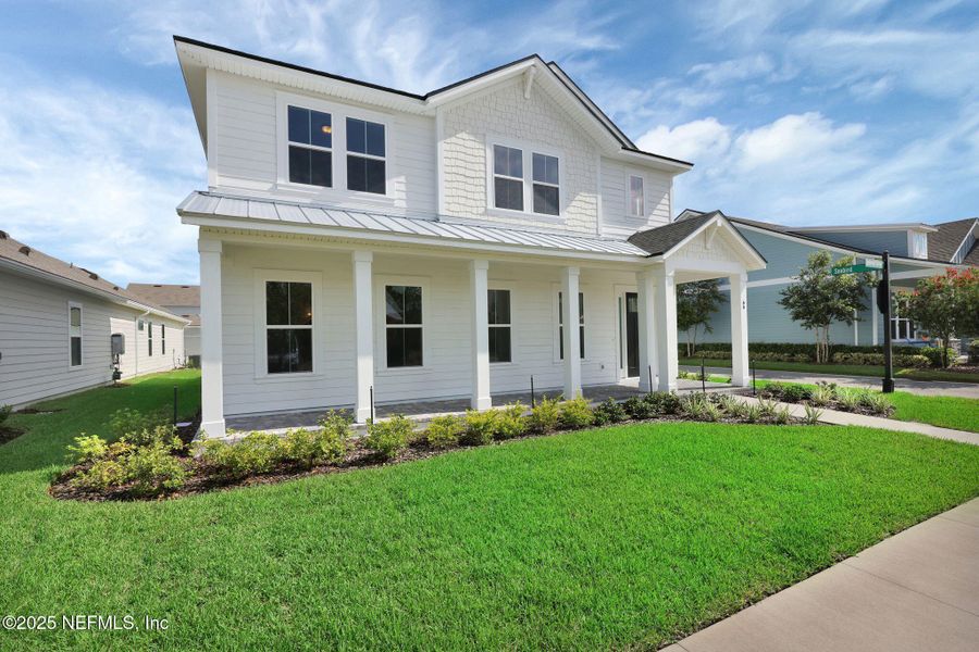 Front exterior of a new home in Seabrook Village at Seabrook, Nocatee, FL, highlighting curb appeal (Image 31). Front exterior of a new home in Seabrook Village at Seabrook, Nocatee, FL, highlighting curb appeal (Image 31).