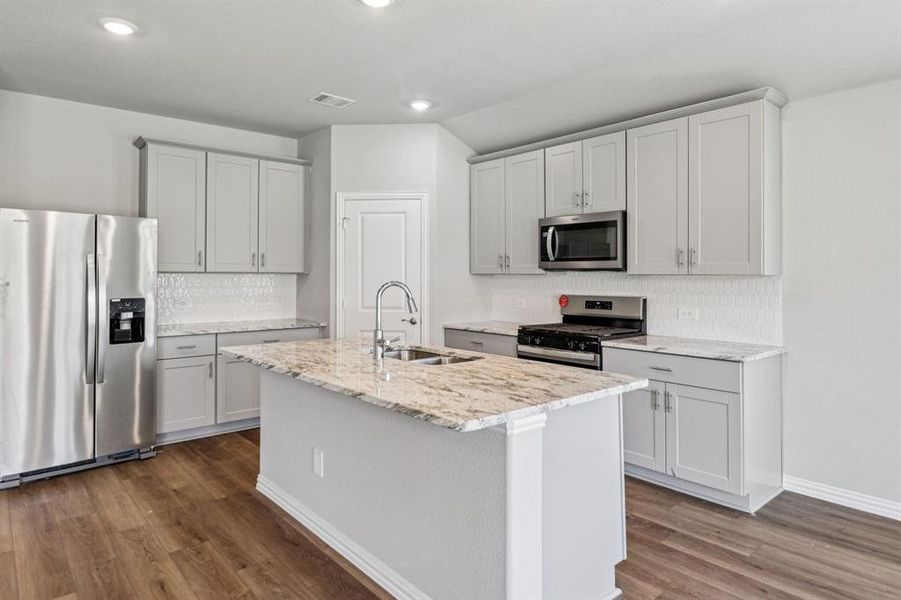 Photo is not of the actual home, but is an inspirational photo of builder’s model home and may depict options, furnishings, and/or decorator features that are not included.