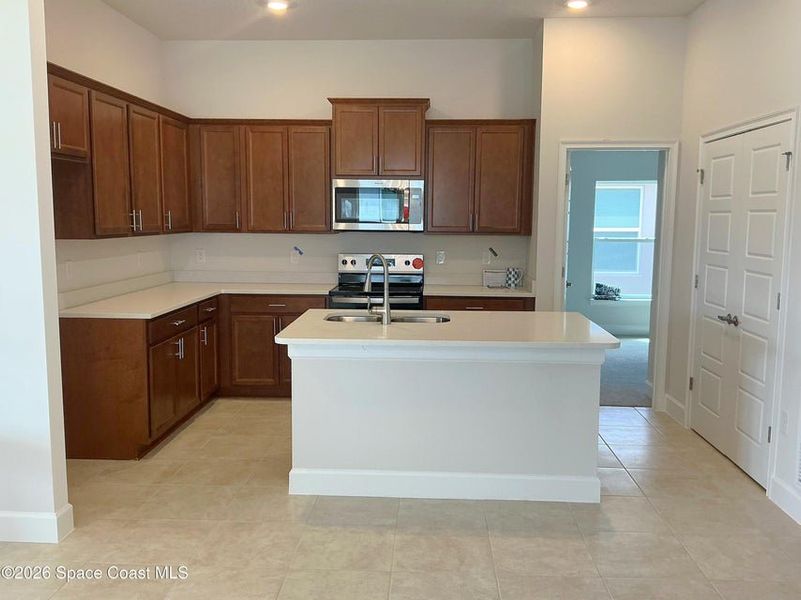 Furnished interior view inside a new home in St. John Preserve, Palm Bay (Image 4).
